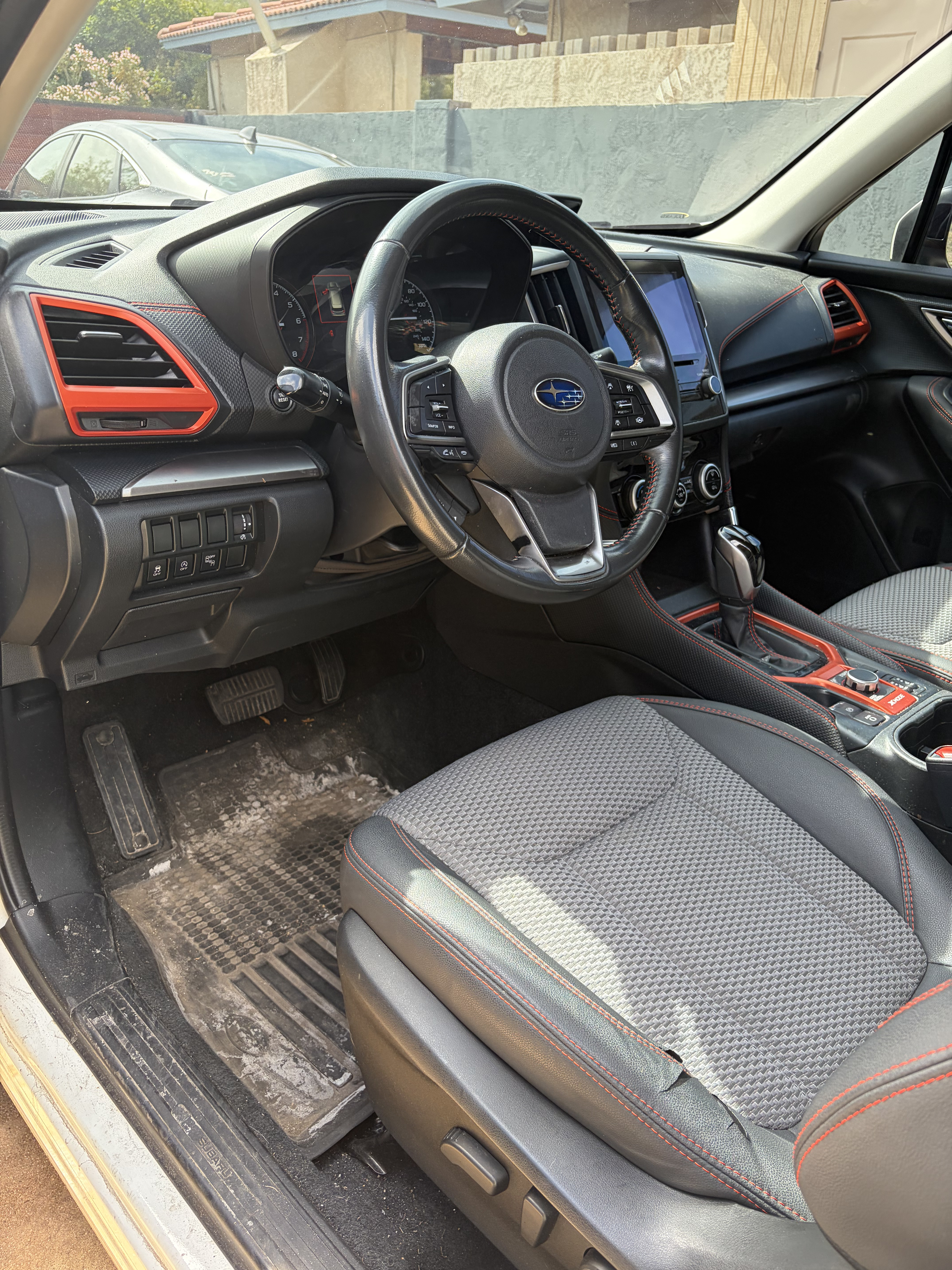 Car interior before mobile detailing in Phoenix AZ